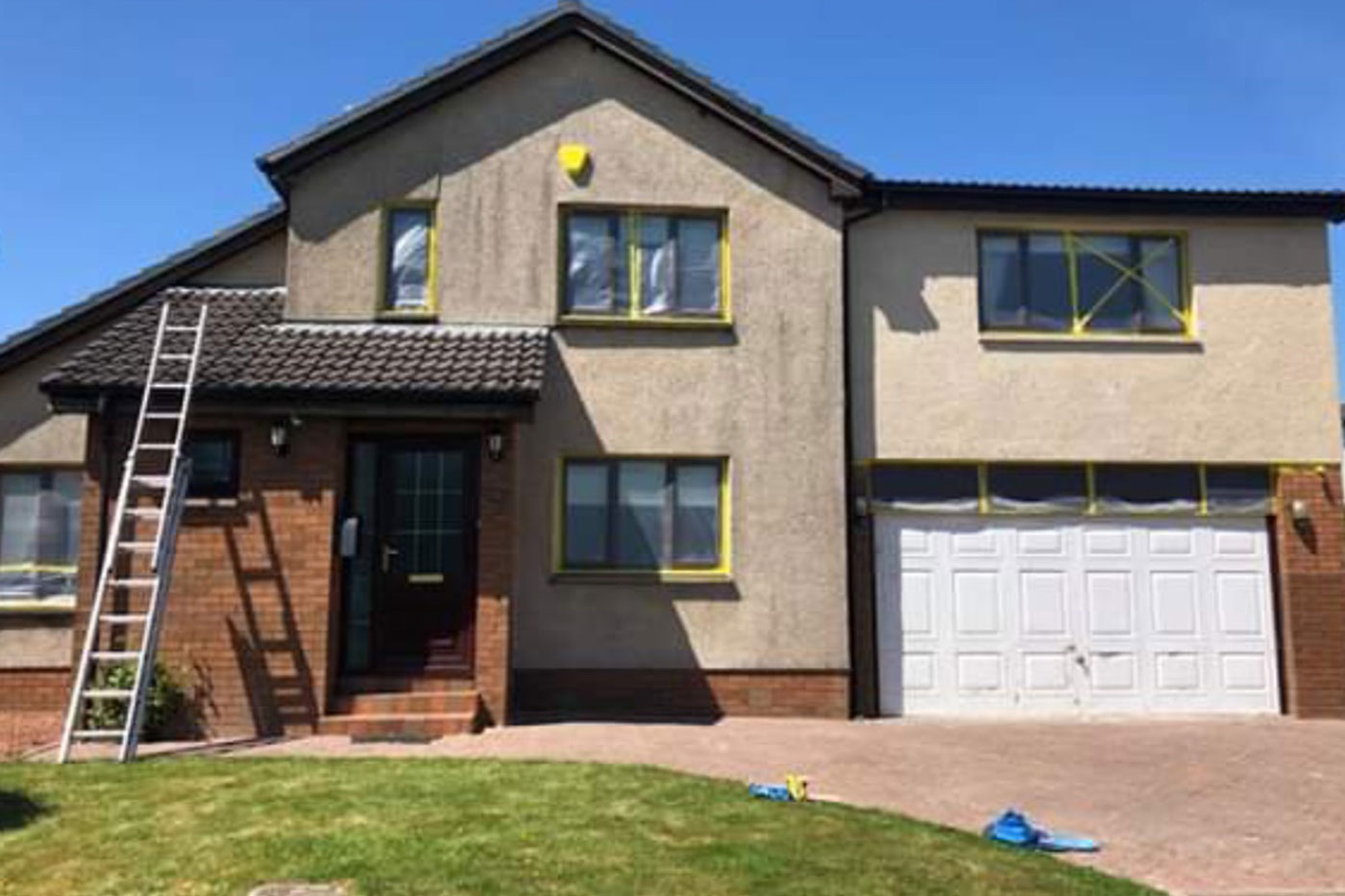 The exterior of a house being decorated - exterior decorating glasgow